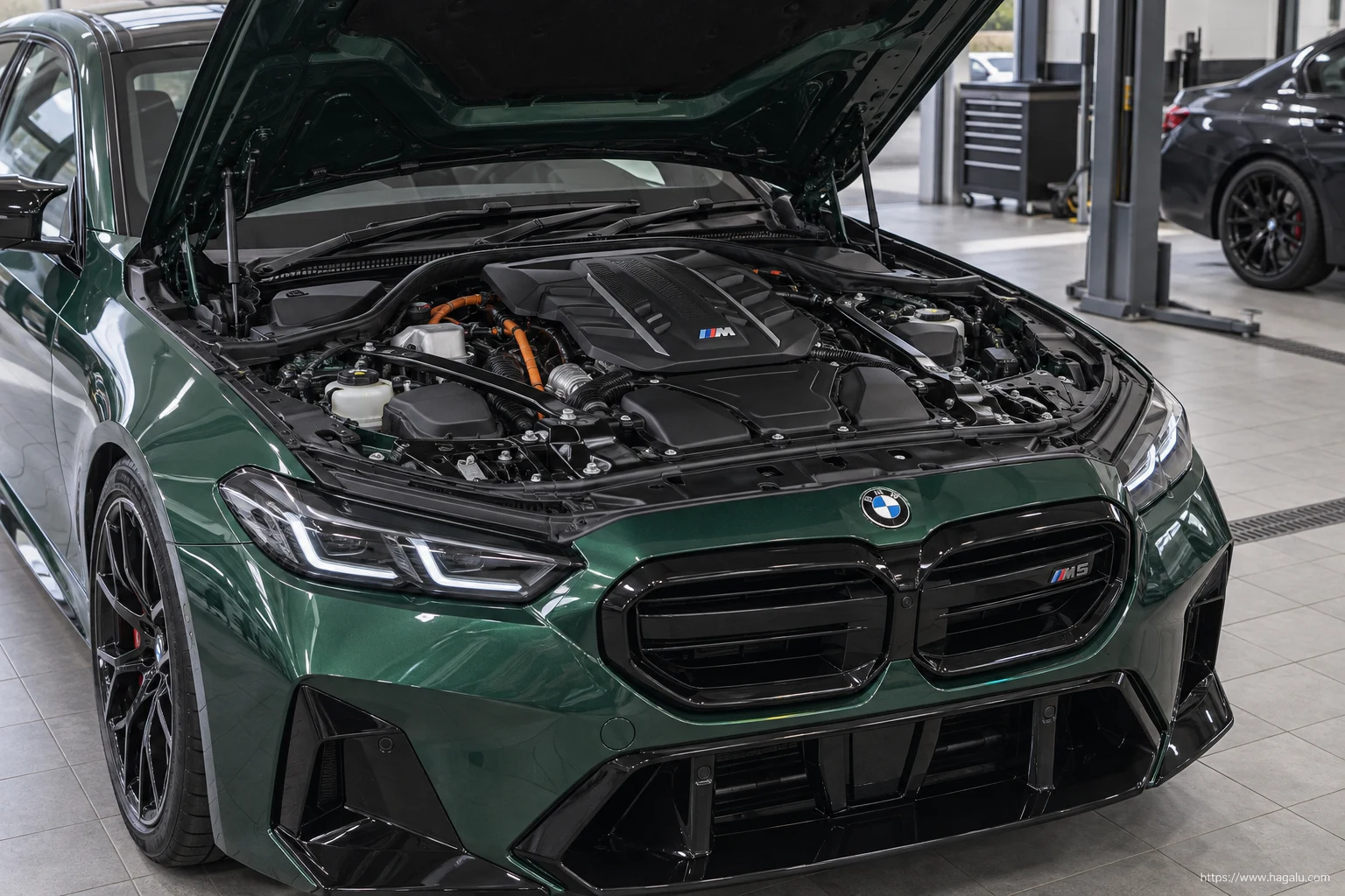 BMW M5 Sedan open bonnet and powertrain bay showing the under-bonnet layout in South Africa