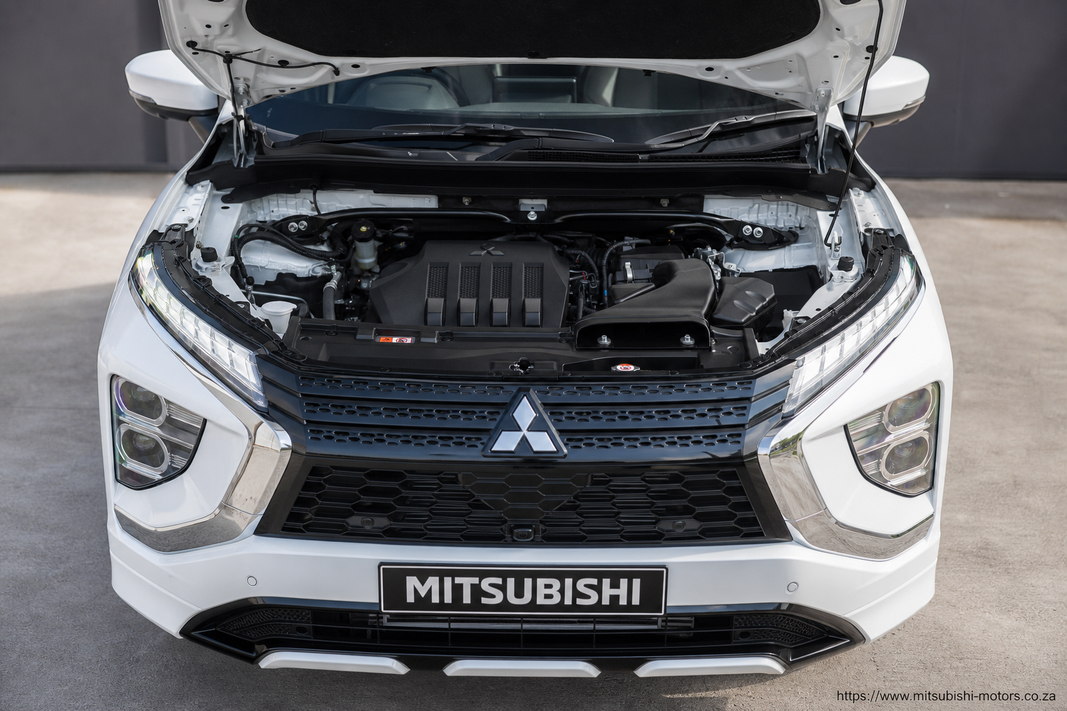 Mitsubishi Eclipse Cross open bonnet and powertrain bay showing the under-bonnet layout in South Africa