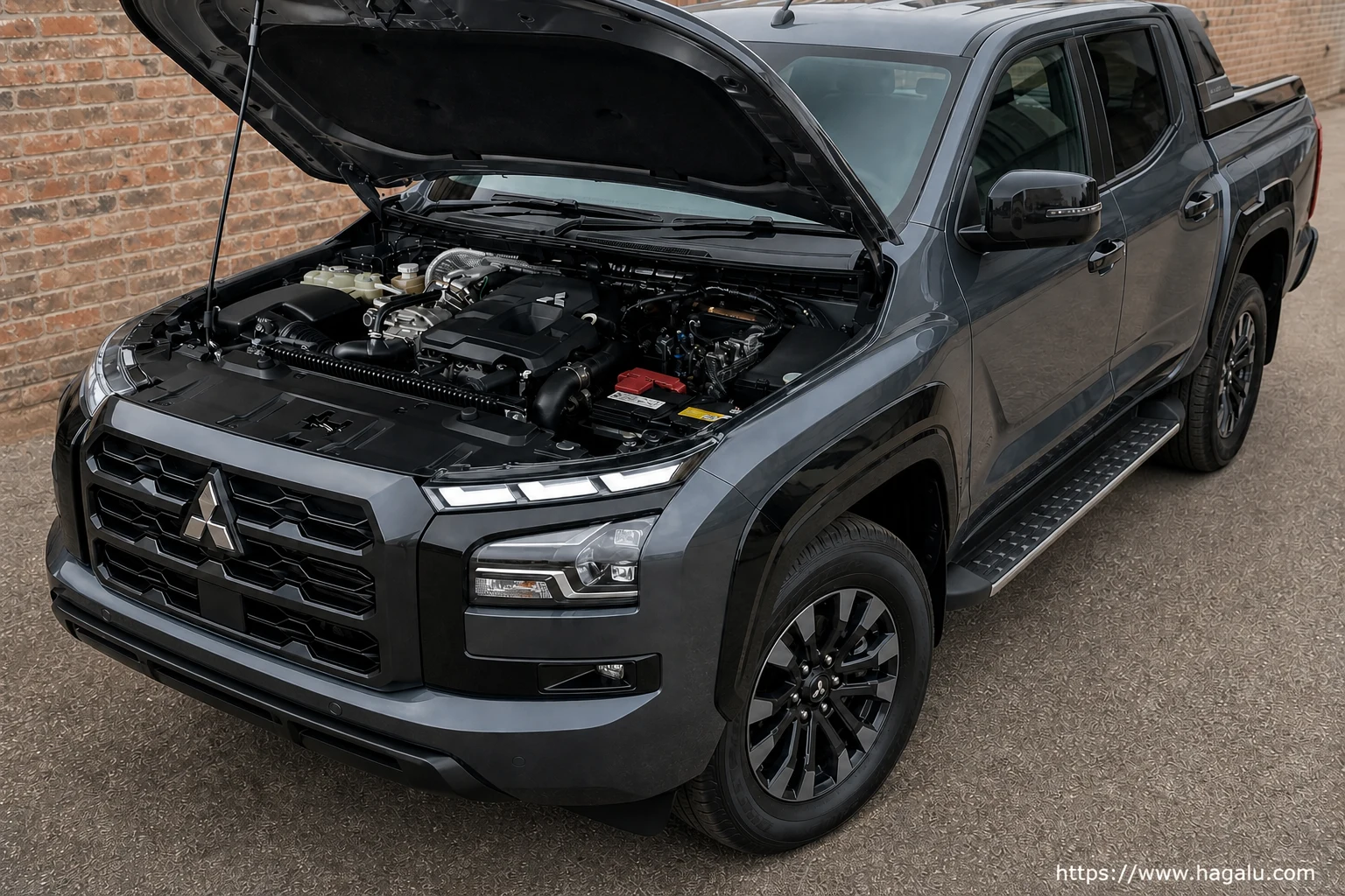 Mitsubishi Triton Double Cab open bonnet and powertrain bay showing the under-bonnet layout in South Africa