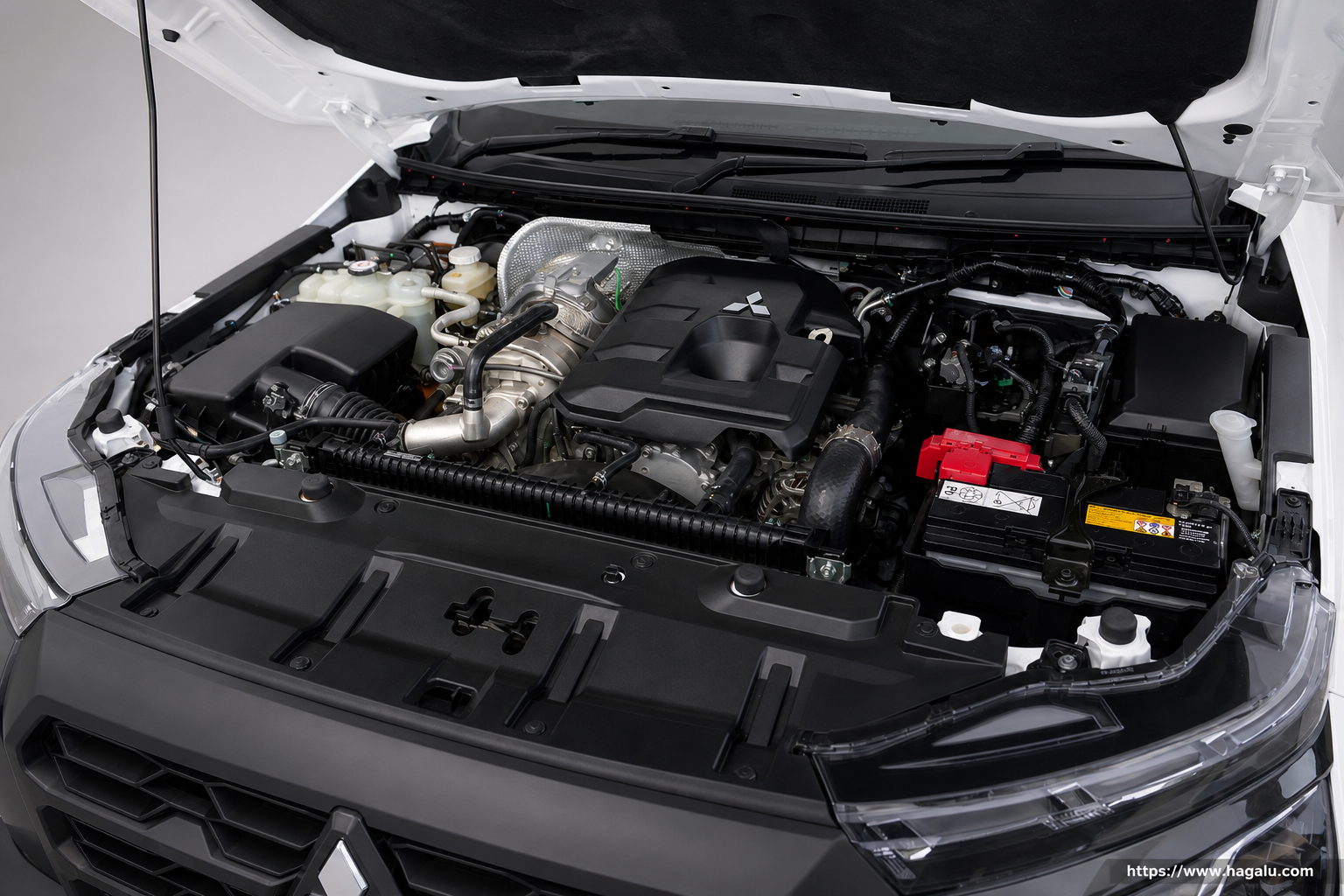 Mitsubishi Triton Single Cab open bonnet and powertrain bay showing the under-bonnet layout in South Africa