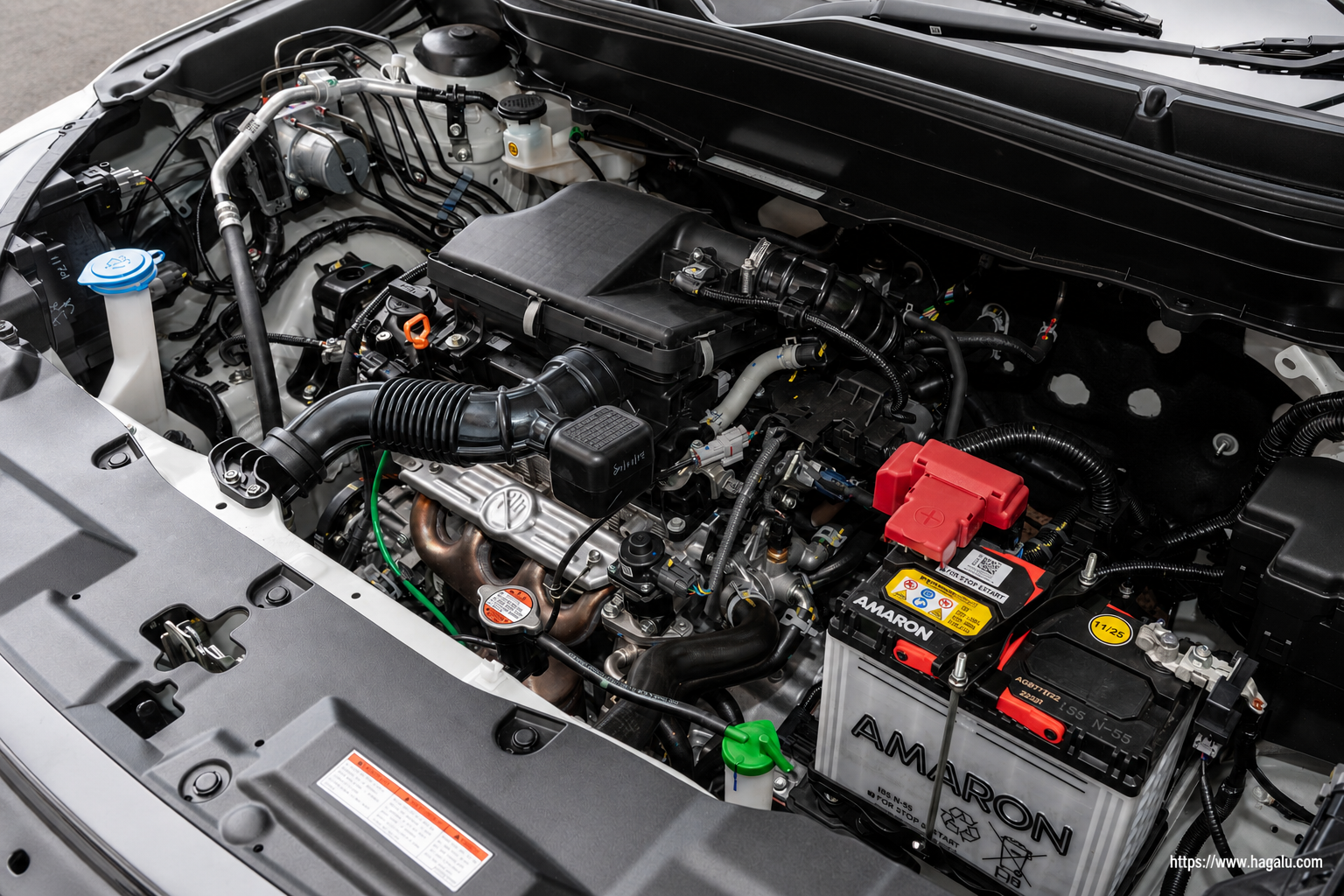Suzuki Across open bonnet and powertrain bay showing the under-bonnet layout in South Africa