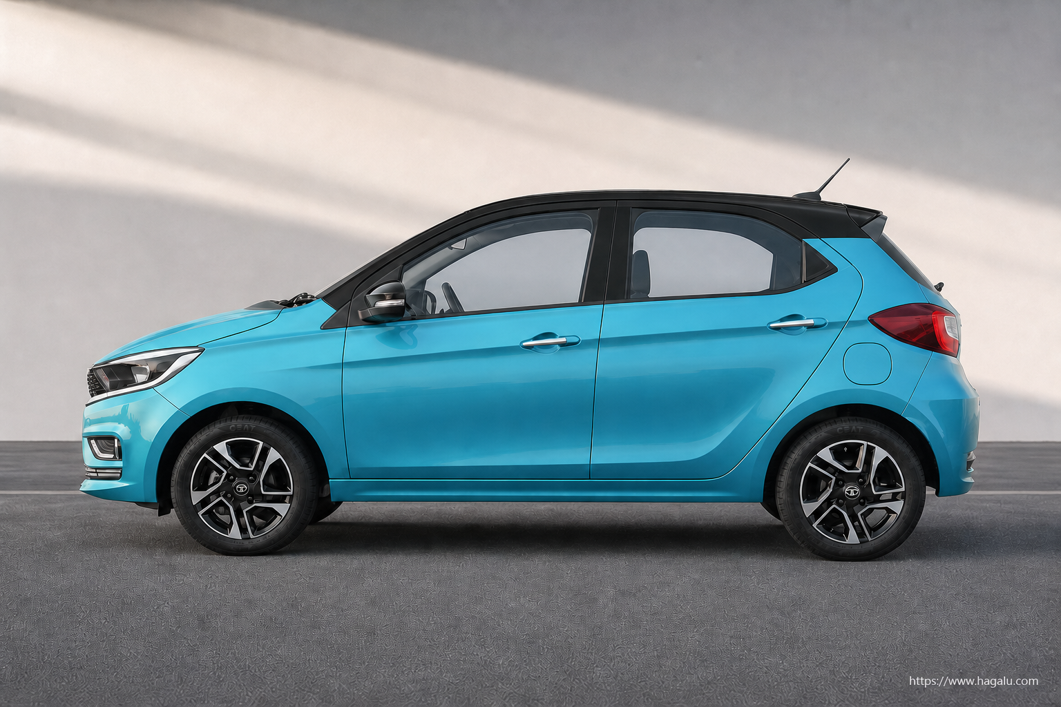 Tata Tiago full side profile showing the roofline, doors and wheel design in South Africa