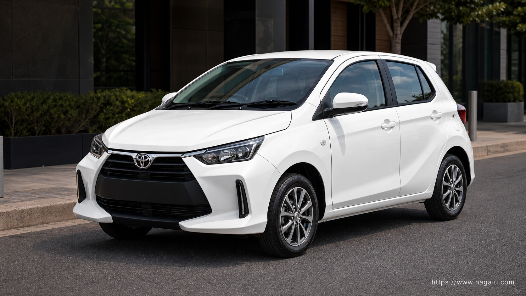 Toyota Agya front three-quarter exterior showing the grille, headlights and body design in South Africa