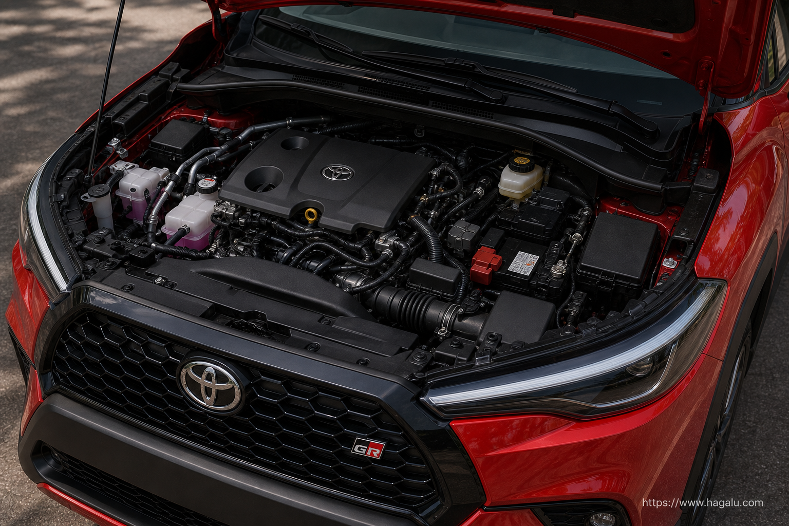 Toyota Corolla Cross open bonnet and powertrain bay showing the under-bonnet layout in South Africa