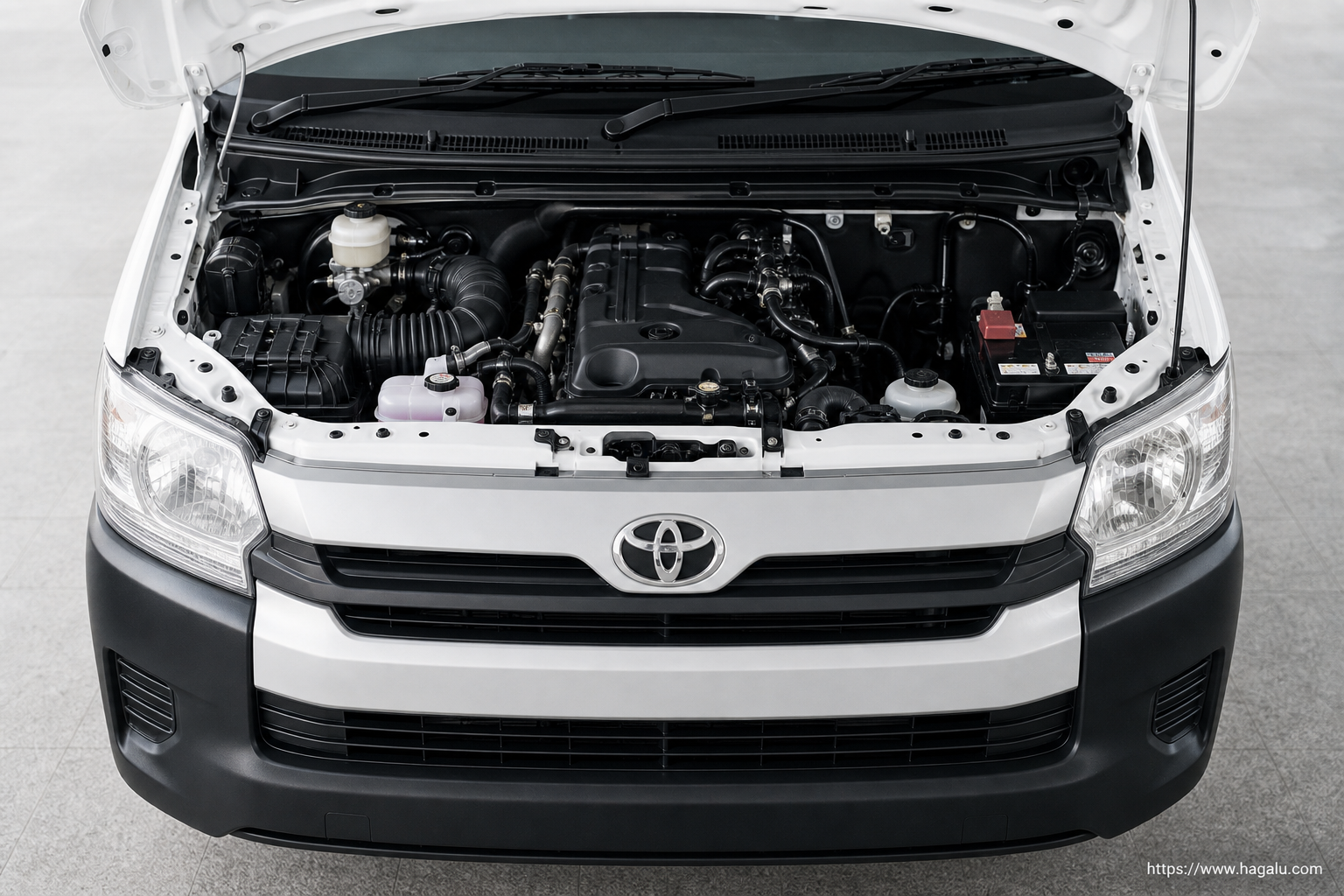 Toyota Quantum open bonnet and powertrain bay showing the under-bonnet layout in South Africa